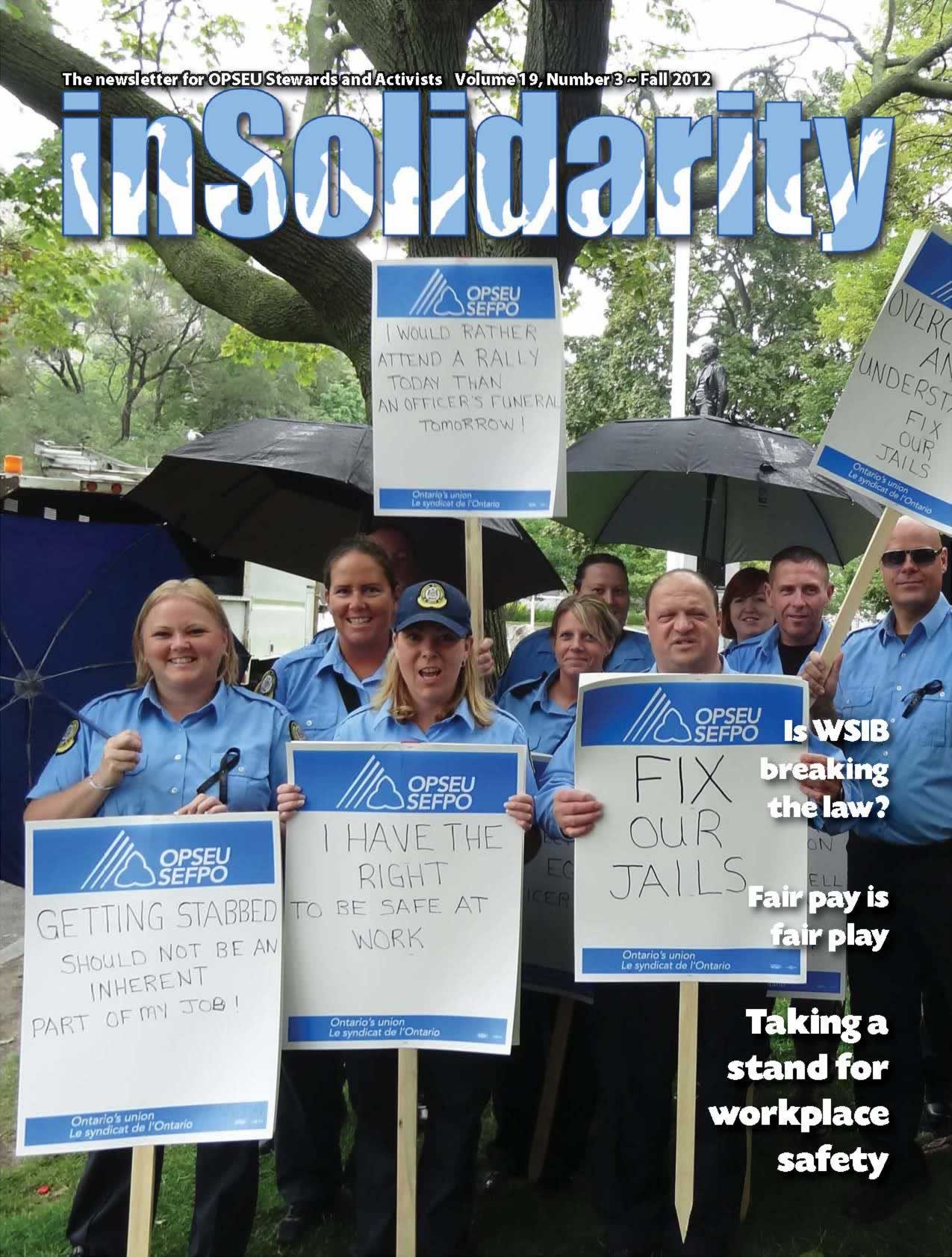 In Solidarity, Fall 2012 cover. Correctional officers holding up signs that say: Fix our jails