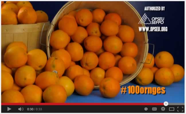 Basket of oranges with the hashtag 100 ornges