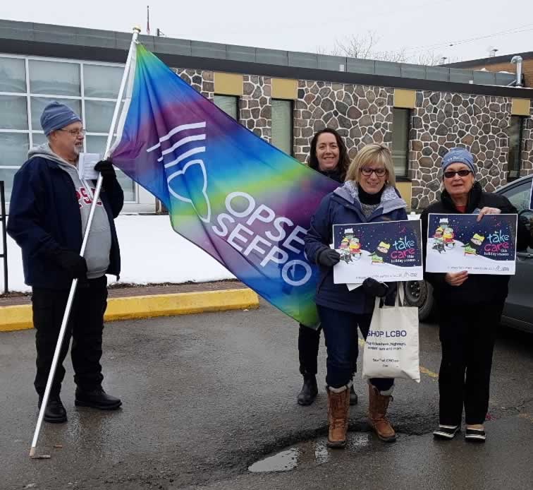 OPSEU members with flag