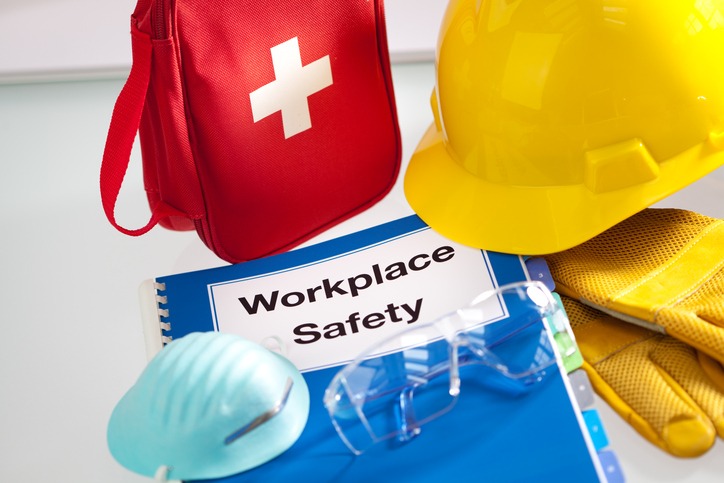 Workplace Safety booklet, mask, first aid kit, helmet and gloves.