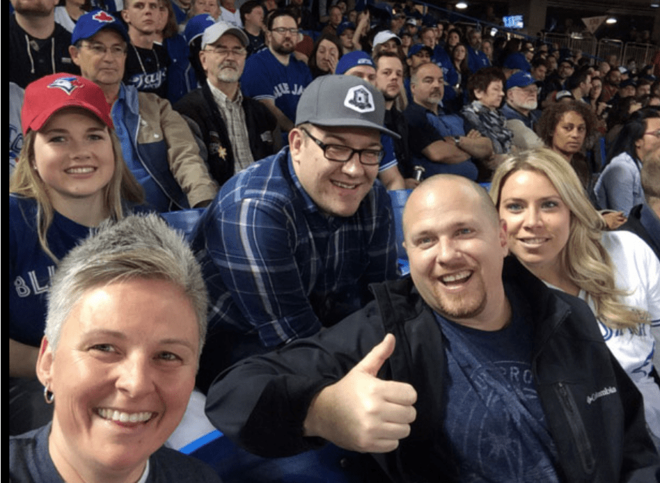 Large group of OPSEU members in the stands at a Blue Jays game.