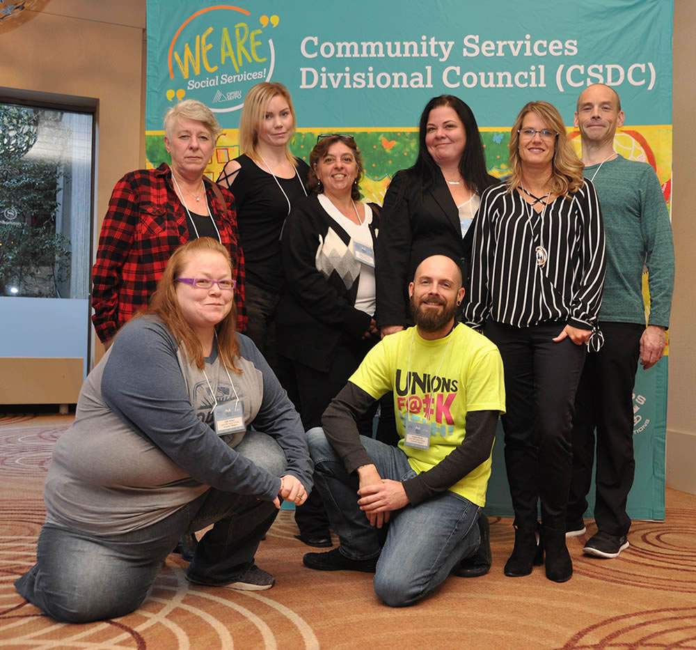 Develomental Services Executive: Back (l-r) Karen McKinnon (bargaining rep-at-large), Courtney Huycke (health & safety rep), Silvana Cacciatore (vice-chair 2b), Erin Smith-Rice (chair), Wendy Nield (vice-chair 2c), Scott Collins (secretary treasurer). Front (l-r) Kelly Holmes (communications rep), Stephen Woods (vice-chair 2a)