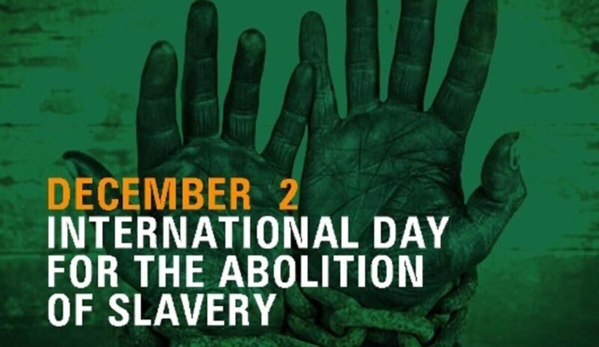 Two greay hands raised palms-forward against a blue background with the title below: December 2, International Day for the Abolition of Slavery